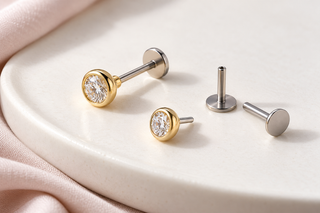Illustrative diamond flat-back stud and separate silver-colored post components