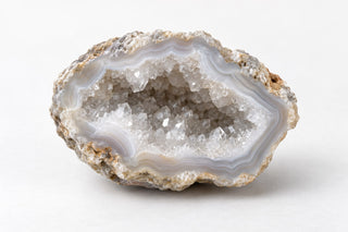 Editorial illustration of a quartz-lined agate geode cavity