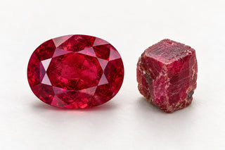 Editorial illustration of red ruby with cut and rough corundum forms