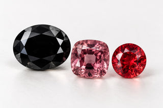 Editorial illustration of black, pink and red spinel