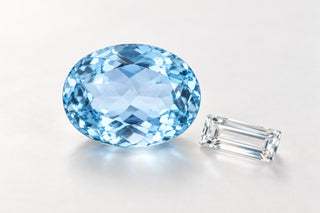 Editorial illustration of blue and colorless topaz