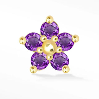 Five-petal decorative jewelry top with purple stones and gold-colored prongs