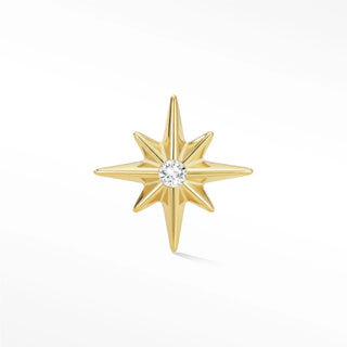 A gold-toned star-shaped 14k gold flat earring with a central round diamond from the Wynning Studs collection