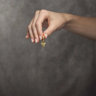 A delicate gold-toned forged triangle 15mm pendant with hammered texture for vermeil convertible earrings