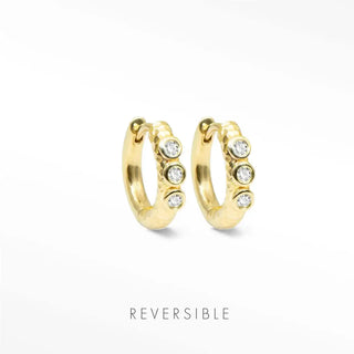 14k gold hoop earrings feature textured gold hoops with four clear round stones as fine jewelry