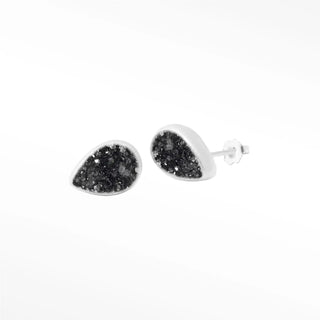 Teardrop-shaped petite black druzy silver stud earrings with black druzy interior in sleek white metal frame