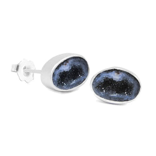 Adorn petite geode silver stud earrings featuring deep blue geode interior with sparkling black crystal formations