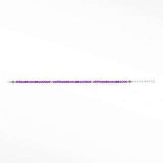 Amethyst gemstone beads close-up; metal fittings are outside the crop