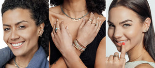 A woman wearing a delicate gold necklace with small, evenly spaced rectangular pendants.
