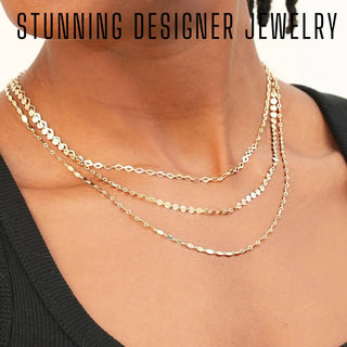 Gold-toned layered necklace with intricate geometric chain links for a bespoke jewelry experience gift