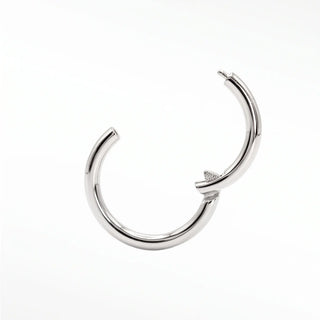Cartilage hoop earrings featuring a sleek polished finish in solid 14k white gold. 16g minimalist designed for everyday