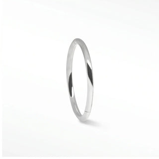 Cartilage hoop earrings featuring a sleek polished finish in solid 14k white gold. 16g minimalist designed for everyday