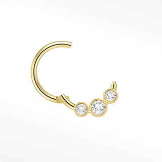 Gold 14k cartilage hoop earrings featuring a curved design with three clear round-cut gemstones