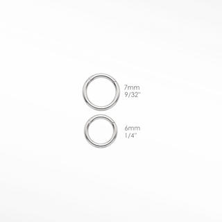 The snake 18g clicker 14k white is a bold and unique piece of body jewelry designed to make