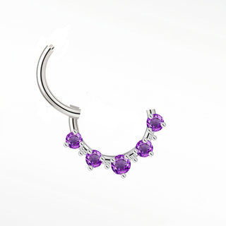 Cartilage hoop earrings in 14k white gold with five radiant amethysts. Add a regal pop of violet color to your daith