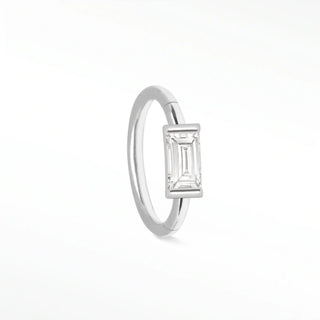 Cartilage hoop earrings in 14k white gold with a modern baguette lab grown diamond. Discover architectural luxury