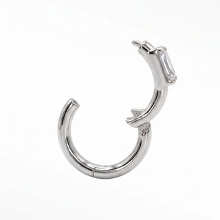 Cartilage hoop earrings in 14k white gold with a modern baguette lab grown diamond. Discover architectural luxury