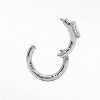 Cartilage hoop earrings in 14k white gold with a modern baguette lab grown diamond. Discover architectural luxury