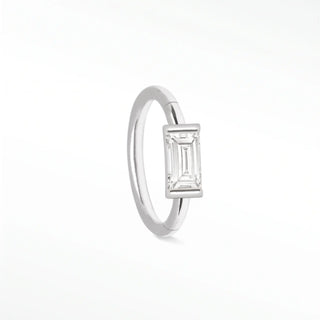 Cartilage hoop earrings with a 14k white gold baguette lab diamond. Handcrafted for snug fit and modern glow this 18g