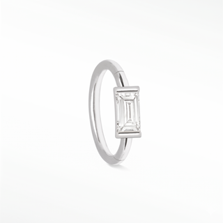 Cartilage hoop earrings with a 14k white gold baguette lab diamond. Handcrafted for snug fit and modern glow this 18g