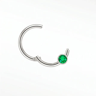 Cartilage hoop earrings in 14k white gold with a bezel-set emerald. Display vibrant forest-green glow your ear stack