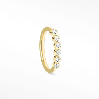 Delicate 14k gold cartilage hoop earrings featuring six bezel-set round-cut diamonds in a minimalist eternity design