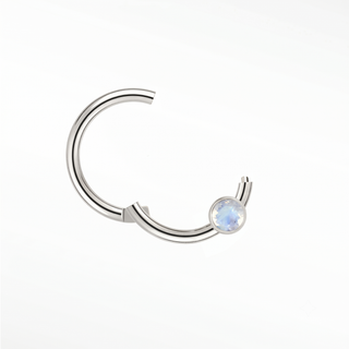 Cartilage hoop earrings in 14k white gold with a bezel-set moonstone. Capture luminous ethereal glow for your ear stack