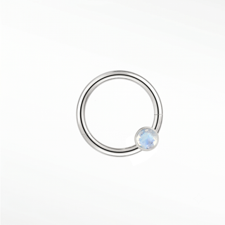 Cartilage hoop earrings in 14k white gold with a bezel-set moonstone. Capture luminous ethereal glow for your ear stack