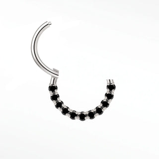 Cartilage hoop earrings in 14k white gold with a bold black diamond arc. Contrast warm mysterious obsidian stones