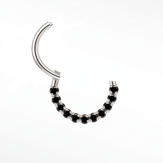 Cartilage hoop earrings in 14k white gold with a bold black diamond arc. Contrast warm mysterious obsidian stones