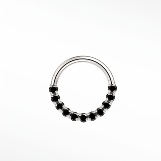 Cartilage hoop earrings in 14k white gold with a bold black diamond arc. Contrast warm mysterious obsidian stones