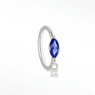 Cartilage hoop earrings with a marquise blue sapphire and dangling lab diamond. Handcrafted in 14k white gold this aria