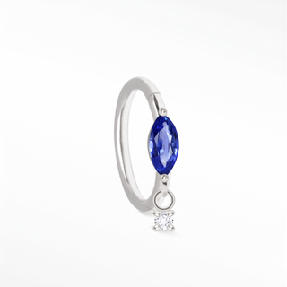 Cartilage hoop earrings with a marquise blue sapphire and dangling lab diamond. Handcrafted in 14k white gold this aria