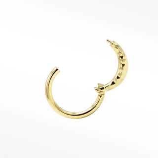 Cartilage hoop earrings in 14k gold with a hammered croissant texture. Elevate your ear stack this chic