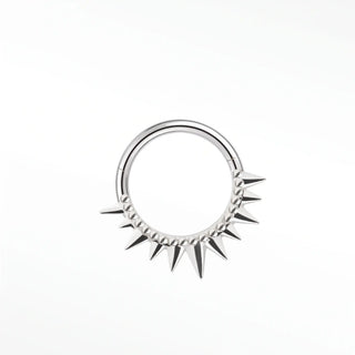 Cartilage hoop earrings in 14k white gold featuring a bold spiked sunburst design. Own modern architectural statement