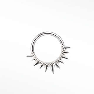 Cartilage hoop earrings in 14k white gold featuring a bold spiked sunburst design. Own modern architectural statement