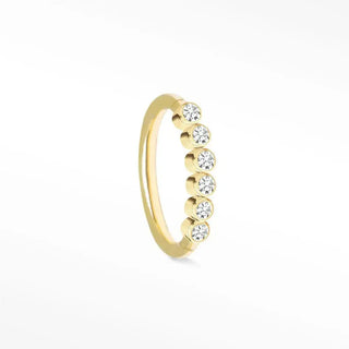 Delicate gold band with six round-cut clear gemstones in a bezel 14k yellow gold cartilage hoop earring diamond design