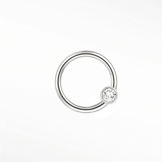 Cartilage hoop earrings in 14k white gold with a bezel-set lab diamond. Highlight your curation this clean minimalist