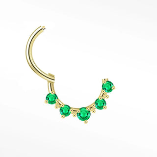 Gold 14k cartilage hoop earrings featuring five vibrant emerald green gemstones along the curved band