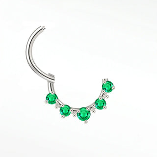 Cartilage hoop earrings in 14k white gold featuring five vibrant emeralds. Radiate botanical luxury and regal green