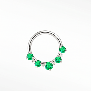 Cartilage hoop earrings in 14k white gold featuring five vibrant emeralds. Radiate botanical luxury and regal green