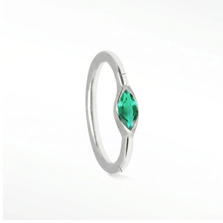 Cartilage hoop earrings featuring a vibrant natural marquise emerald. Handcrafted in 14k white gold for secure stable