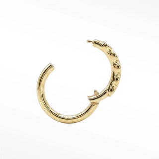 Cartilage hoop earrings featuring striking black diamonds in a bezel eternity setting. This 16g 14k yellow gold adds