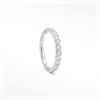 Cartilage hoop earrings with lab grown diamonds in a bezel eternity style. This 16g 14k white gold adds brilliant