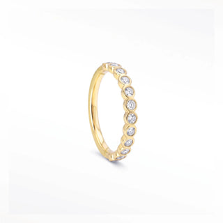 Cartilage hoop earrings with lab grown diamonds in a bezel eternity style. This 16g 14k gold adds brilliant sparkle