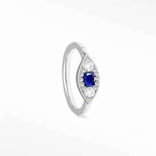 Cartilage hoop earrings with blue sapphire and diamond evil eye in 14k white gold. Handcrafted for protection