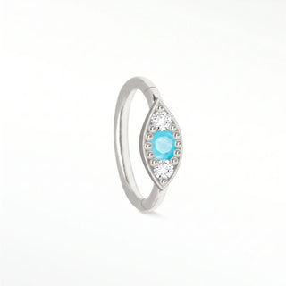 Cartilage hoop earrings featuring a turquoise and diamond evil eye motif in 14k white gold. Channel protection vibrant