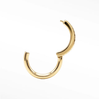 Detailed perspective of the hand-carved Florentine engravings that give the yellow gold its unique matte-satin glow