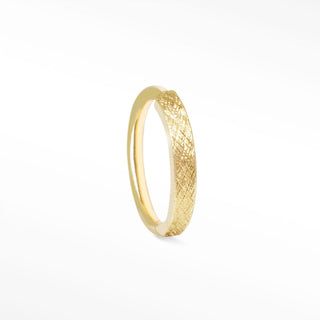 Up-close capture of the delicate, cross-hatched silk finish on a premium gold hoop
