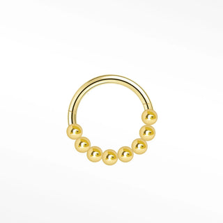 Cartilage hoop earrings by nina wynn featuring a handcrafted 14k yellow gold granulation design. This luxury clicker